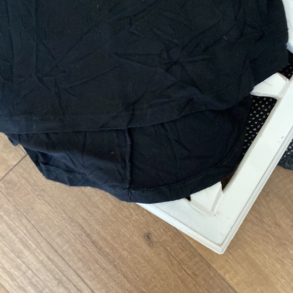 Black tank top with open back and skull design. Size medium. - Picture 4 of 5